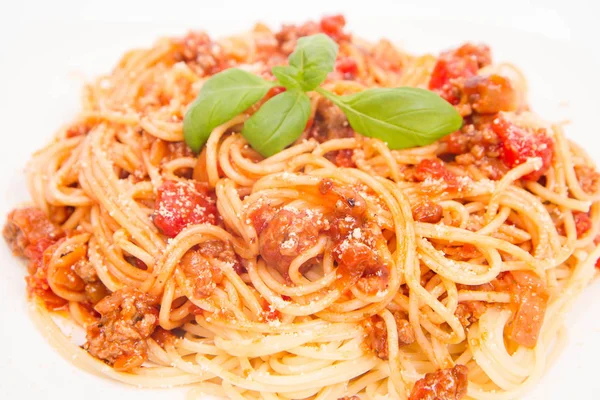 Spaghetti bolognese wordt gegeten — Stockfoto