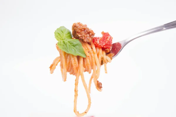 Spaghetti bolognese on a fork — Stock Photo, Image