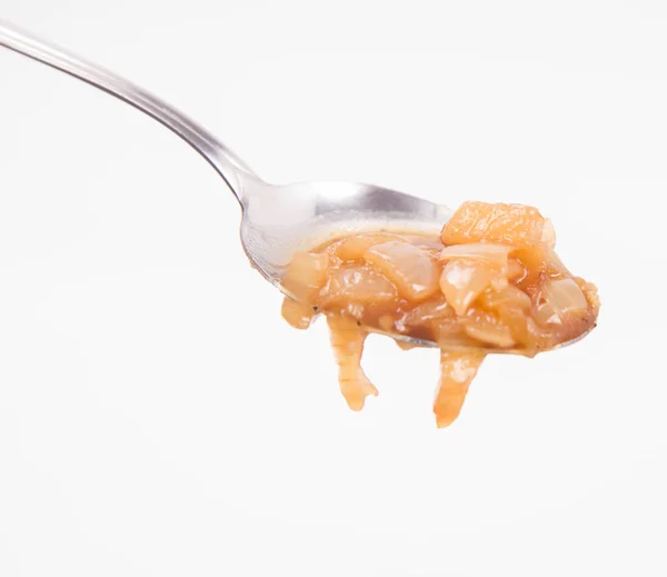 Zwiebelsuppe auf einem Löffel — Stockfoto