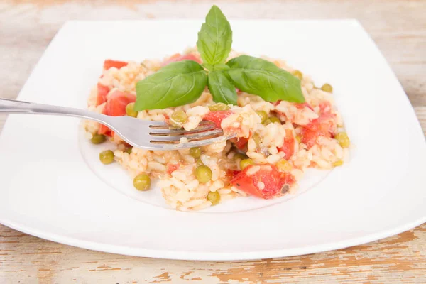 Risotto comido con un tenedor —  Fotos de Stock