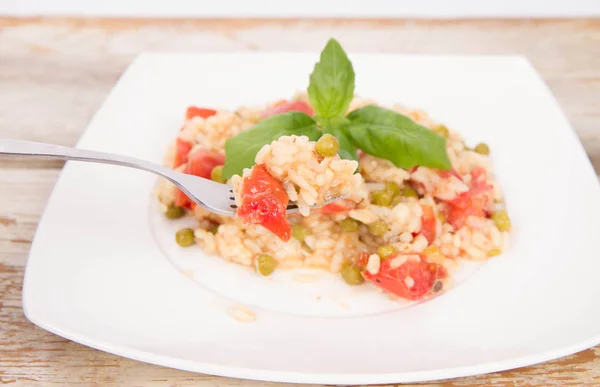 Risotto eaten with a fork — Stock Photo, Image