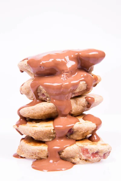 Pancakes covered with chocolate — Stock Photo, Image