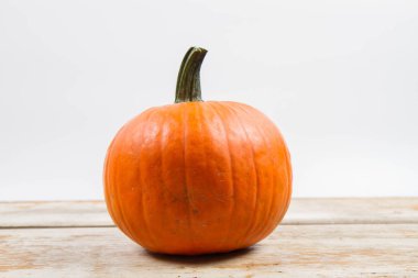 Pumpkins on white