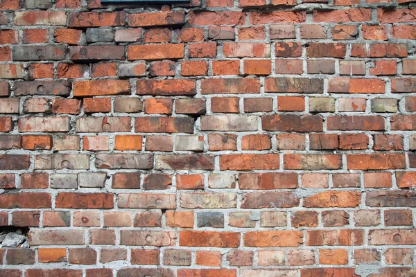 Close up of the Ghetto wall remnant in Warsaw, Poland