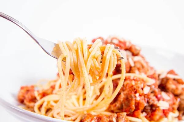 Spaghetti Bolognese Being Eaten Fork White Background — Stock Photo, Image