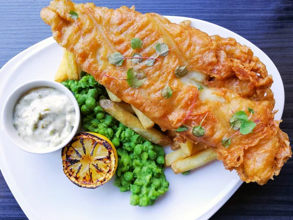 British Traditional fish and chips and  tartar sauce