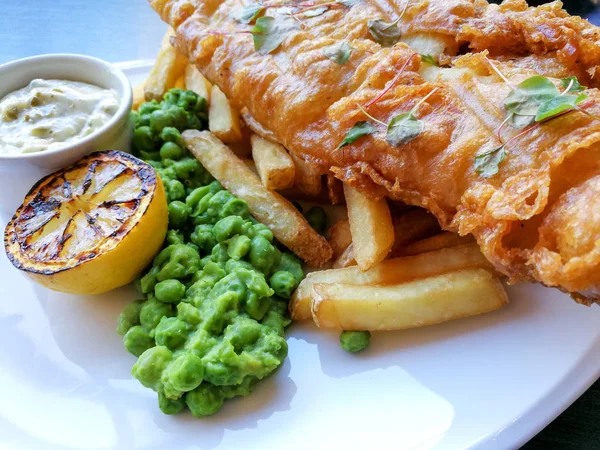 British Traditional fish and chips and  tartar sauce