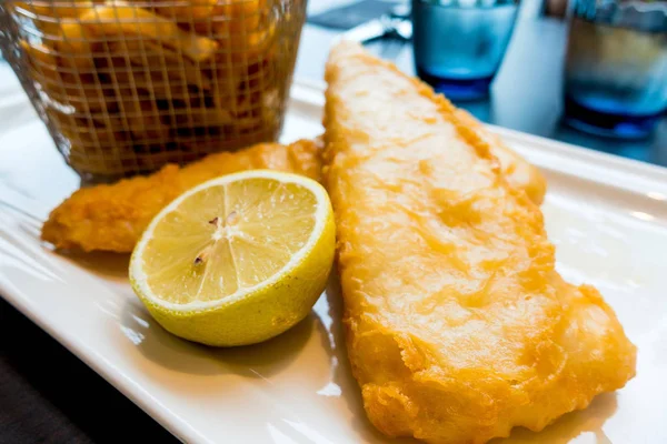 British Traditional fish and chips and  tartar sauce