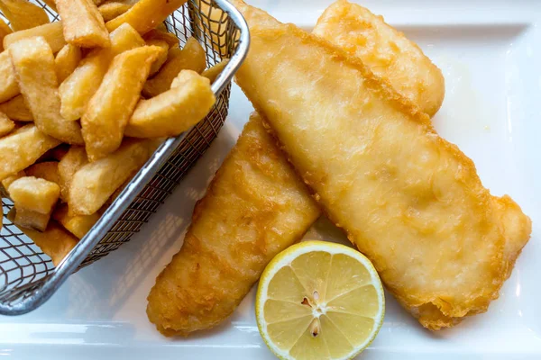 British Traditional fish and chips and  tartar sauce