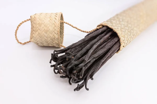 Vanilla pods in a wicker box — Stock Photo, Image