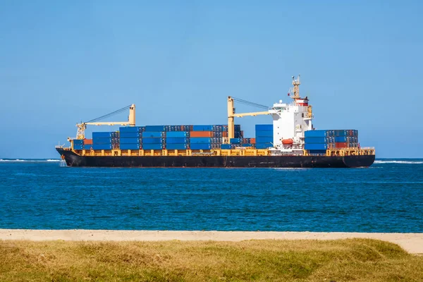 Tropical cargo ship — Stock Photo, Image