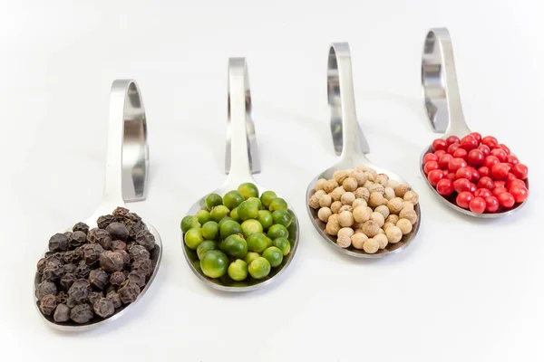 Four kinds of peppercorns — Stock Photo, Image