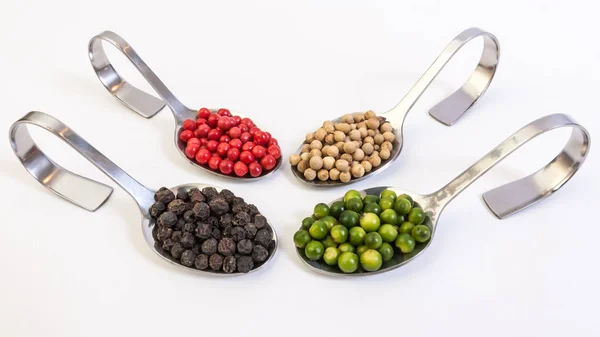 Four kinds of peppercorns — Stock Photo, Image