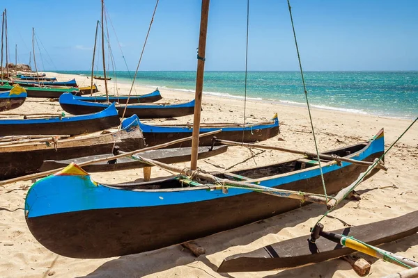 Malagasy outrigger canoes beached — Stock Photo, Image
