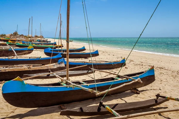 Malagasy outrigger canoes beached — Stock Photo, Image