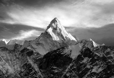 Mount Ama Dablam within clouds clipart