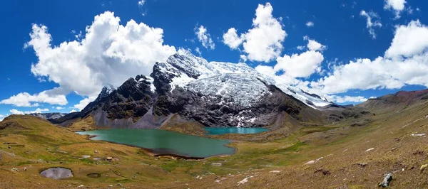 Ausangate trek trekking trail,  moutain with lake and glacier, Ausangate circuit, Cordillera Vilcanota, Cuzco region, Peru, Peruvian Andes landscape, South America