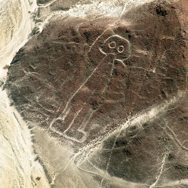 The spaceman or space man, Nazca or Nasca mysterious lines and geoglyphs aerial view, landmark in Peru