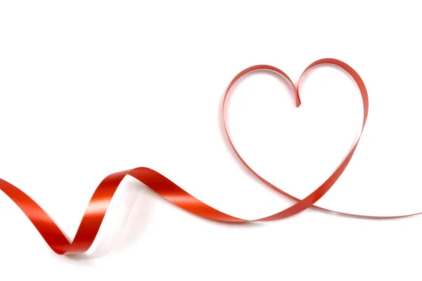 Red ribbon heart shape isolated on white background — Stock Photo, Image