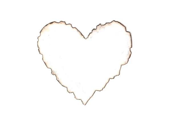 Жжёная бумага в форме сердца — стоковое фото