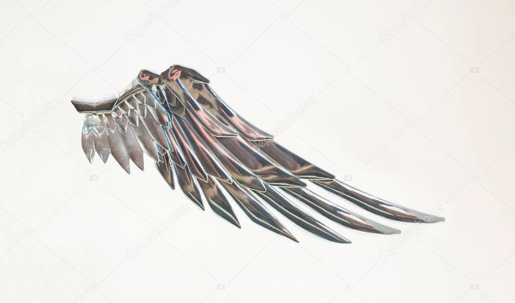 Metallic silver angel wing.Freedom fairy symbol.Isolated