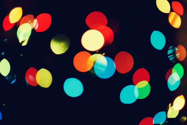 Karácsony, új év háttér színes koszorú fények szép bokeh — Stock Fotó