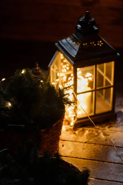 Lantern with led light garland inside. In dark room. Beautiful evening lights. — Stock Photo, Image