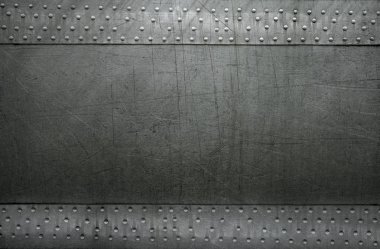 Old metal texture with rivets, steel background clipart