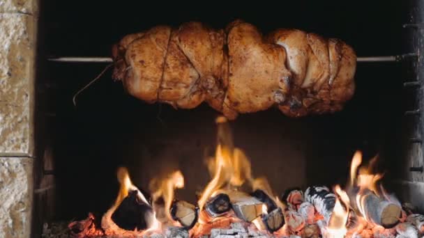 Chicken roasting on a spit — Stock Video