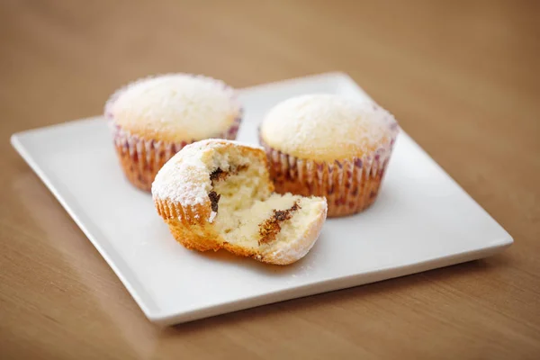 Fresh homemade Muffin on wooden table — Stock Photo, Image