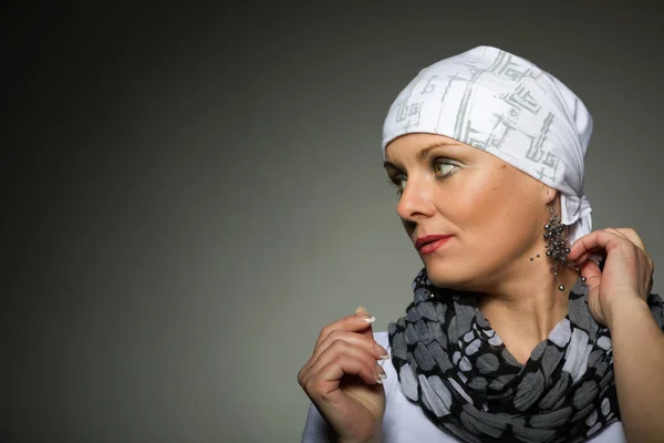 Beautiful middle age woman cancer patient wearing headscarf — Stock Photo, Image