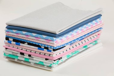 Stack of cotton fabric material clipart