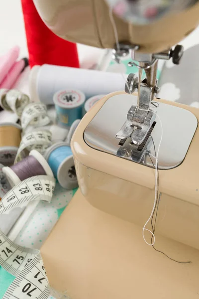 Sewing machine, fabric and measurement tape — Stock Photo, Image