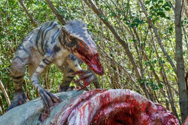 onun bir ava Tarih öncesi dinozorların raptors