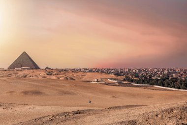 The great pyramid of Khafre in Giza plateau with Cairo cityscape on right side. Egypt clipart
