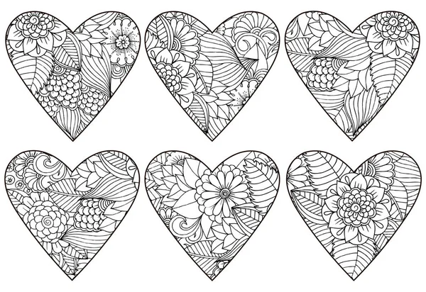 Ensemble vectoriel de cœurs de motif floral . — Image vectorielle