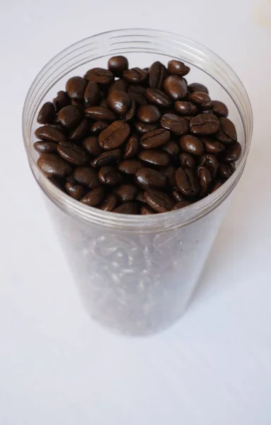 Coffee beans in bottle — Stock Photo, Image