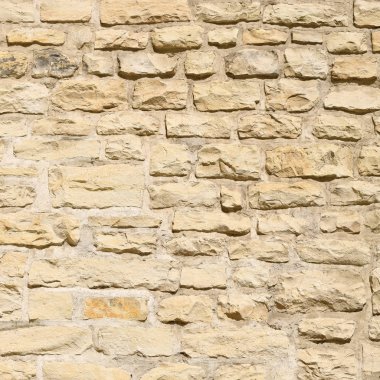 Çatlamış bir taştan bir duvar parçası.