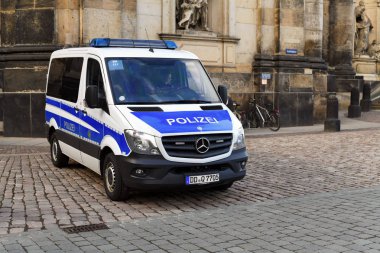 Dresden, Federal Republic of Germany - October 29, 2019: Police patrol car on the street of the old city.