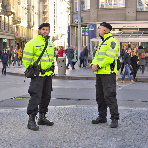 PRAGUE, CZECH REPUBLIC - October 30, 2019: Employees of patrol of the municipal police on the town square of Prague