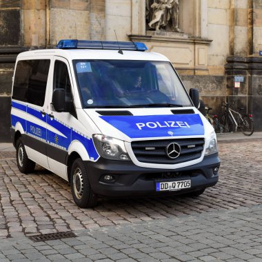 Dresden, Federal Republic of Germany - October 29, 2019: Police patrol car on the street of the old city.