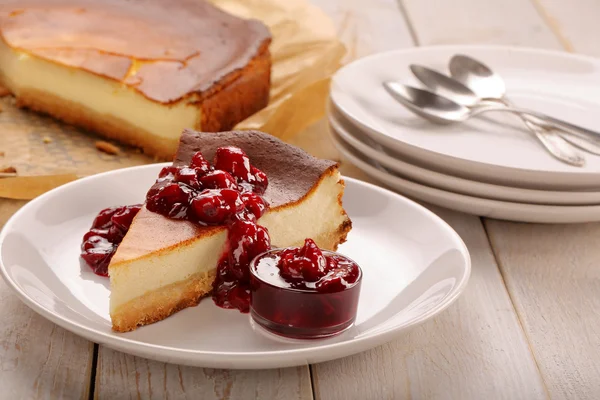 Christmas cheesecake slice with melted chocolate — Stock Photo, Image