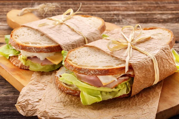 Fresh sandwich with ham cheese and lettuce — Stock Photo, Image