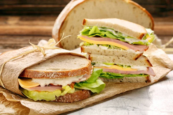 Fresh sandwich with ham cheese and lettuce — Stock Photo, Image