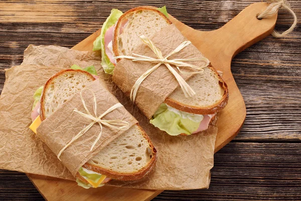 Fresh sandwich with ham cheese and lettuce — Stock Photo, Image