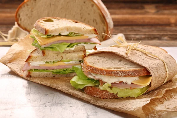 Fresh sandwich with ham cheese and lettuce — Stock Photo, Image