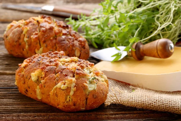 Homemade fresh bread stuffed cheese and garlic with herbs