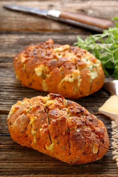 Homemade fresh bread stuffed cheese and garlic with herbs