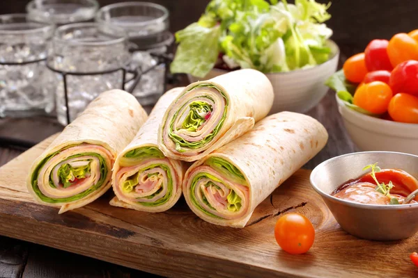 Sandwiches twisted roll tortilla wraps — Stock Photo, Image
