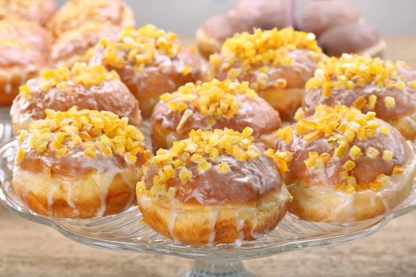 Traditional Polish donuts with jam and orange — Stock Photo, Image